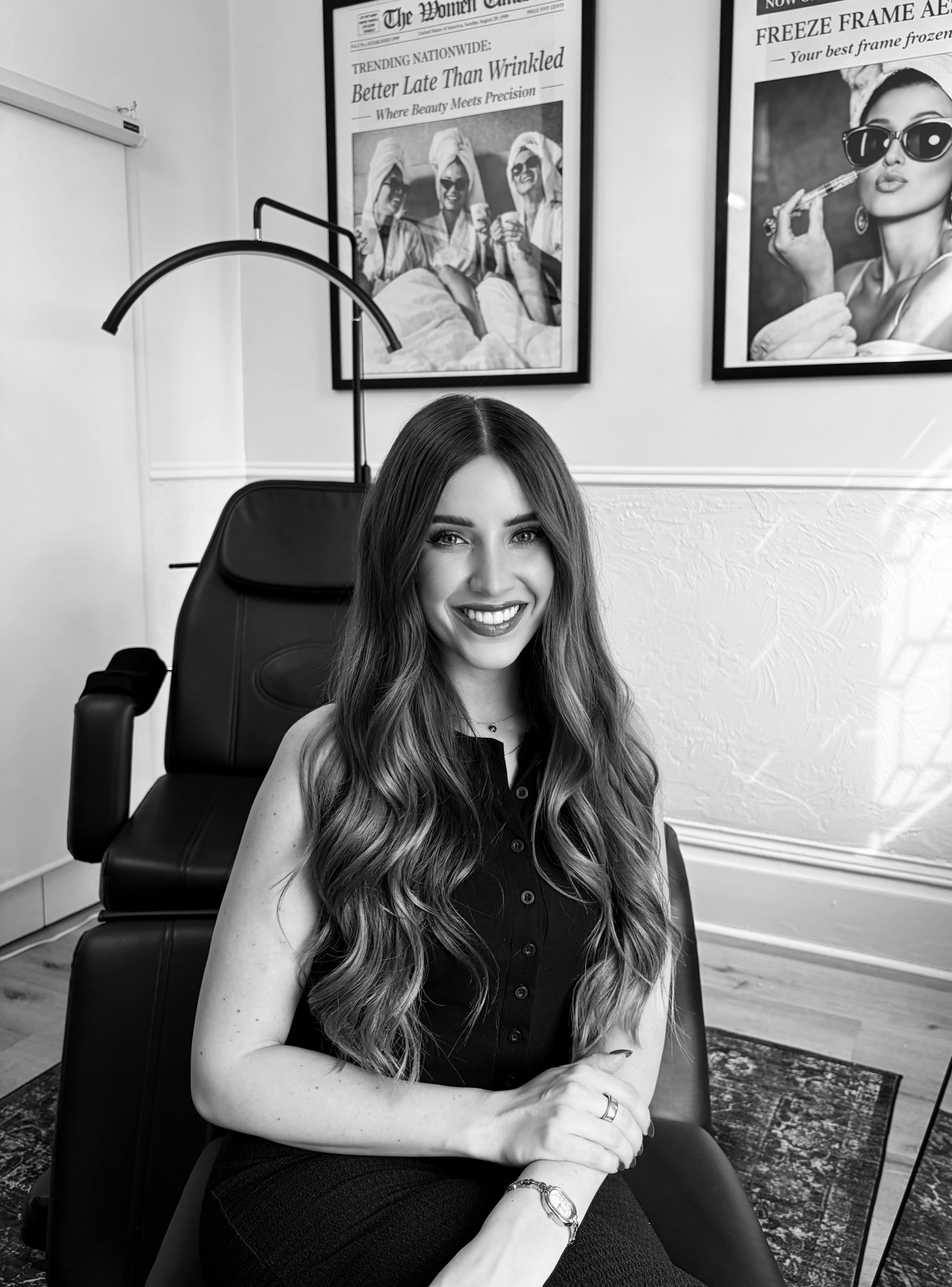 Kelsey smiling at Freeze Frame Aesthetics